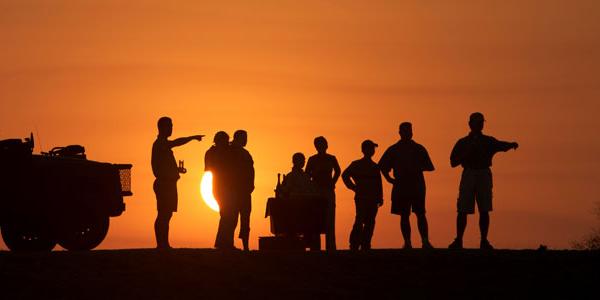 Overland Group gazing in the sunset