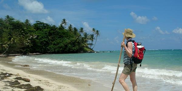 A man walks along one of the beaches on the Mayan Riviera  