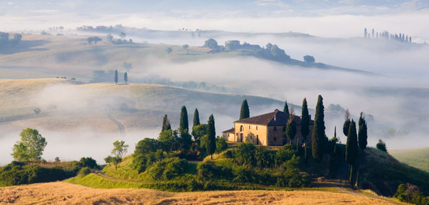 Mist rolls in over the hills of Tuscany
