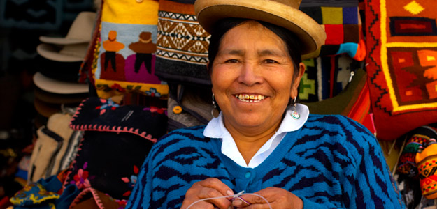 Cuzco woman weaving textiles in Peru