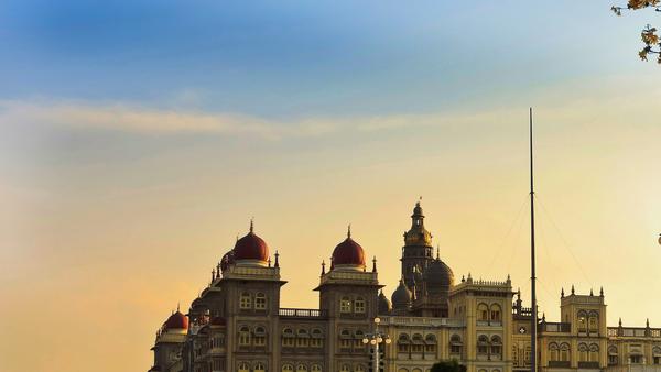 Trace the footsteps of visitors to this opulent royal residence, filled with stories of the Maharajas, clashing architectural styles and hidden secrets.