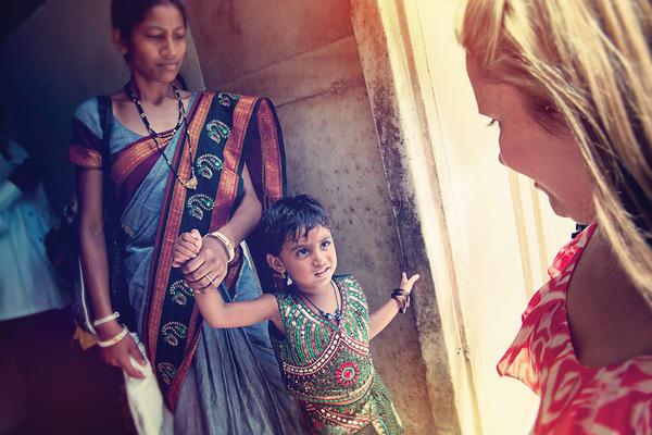 travellers meeting local mother and her daughter