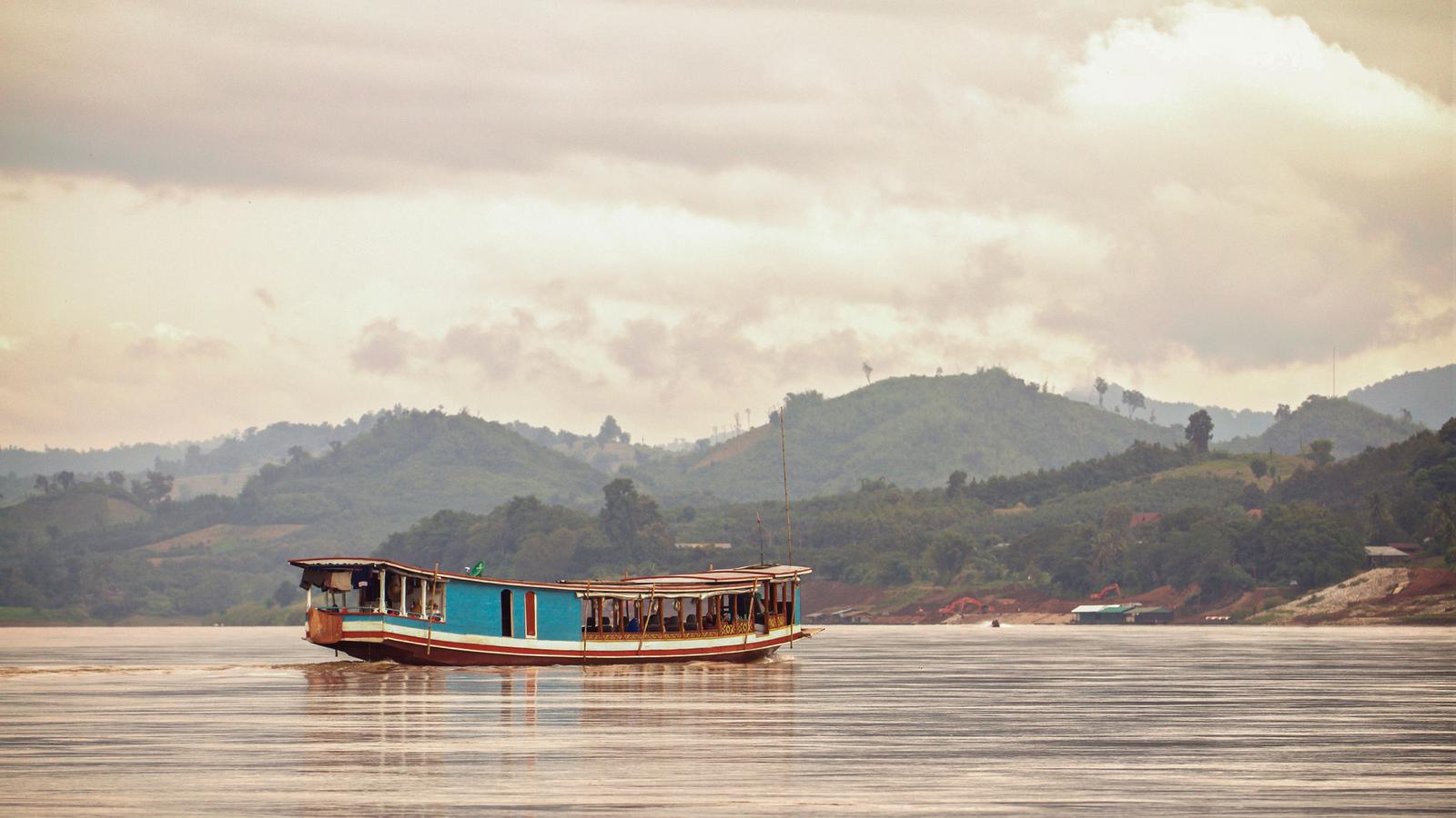 Boat floating on the Mekong River in Laos