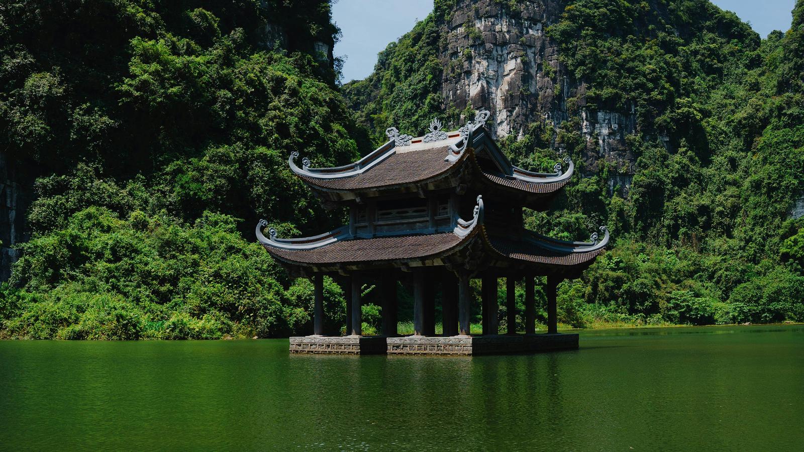 Unsplash: https://unsplash.com/photos/a-pagoda-in-the-middle-of-a-lake-surrounded-by-mountains-N_DpjGQWwrw