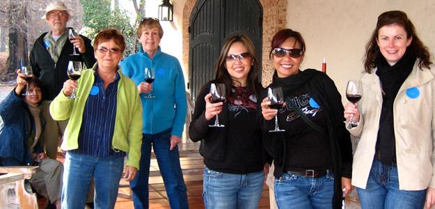 Travellers tasting wine in Chile