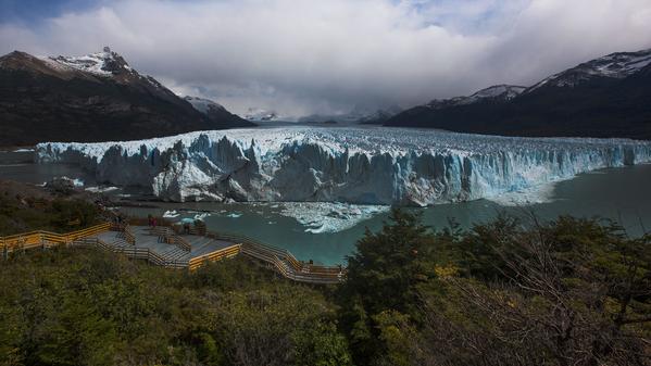 Join Travel blogger Michael Turtle in the shadow of Argentina’s Perito Moreno as huge icebergs on the glacier's face cave and collapse.