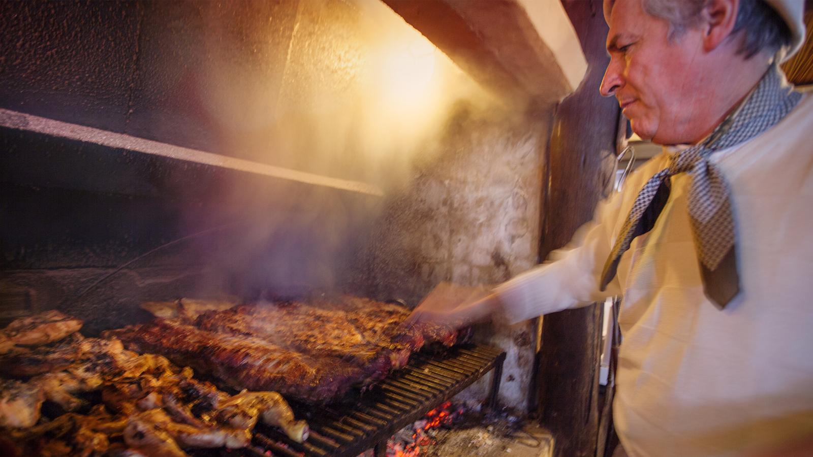 Chef prepares a traditional asado in Buenos Ares