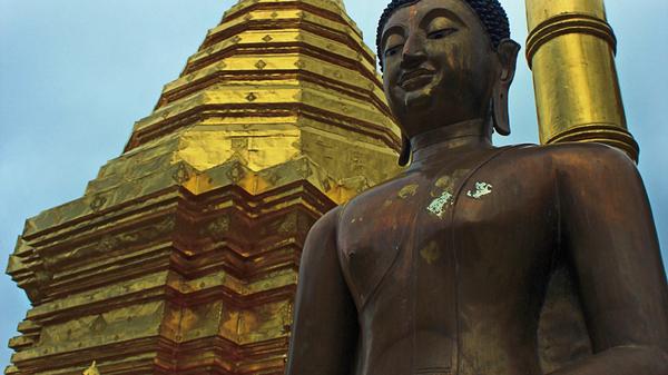 Watch visitors take in Wat Suthep, which has stood enshrined at the top of Doi Suthep mountain in Northern Thailand for over 600 years.