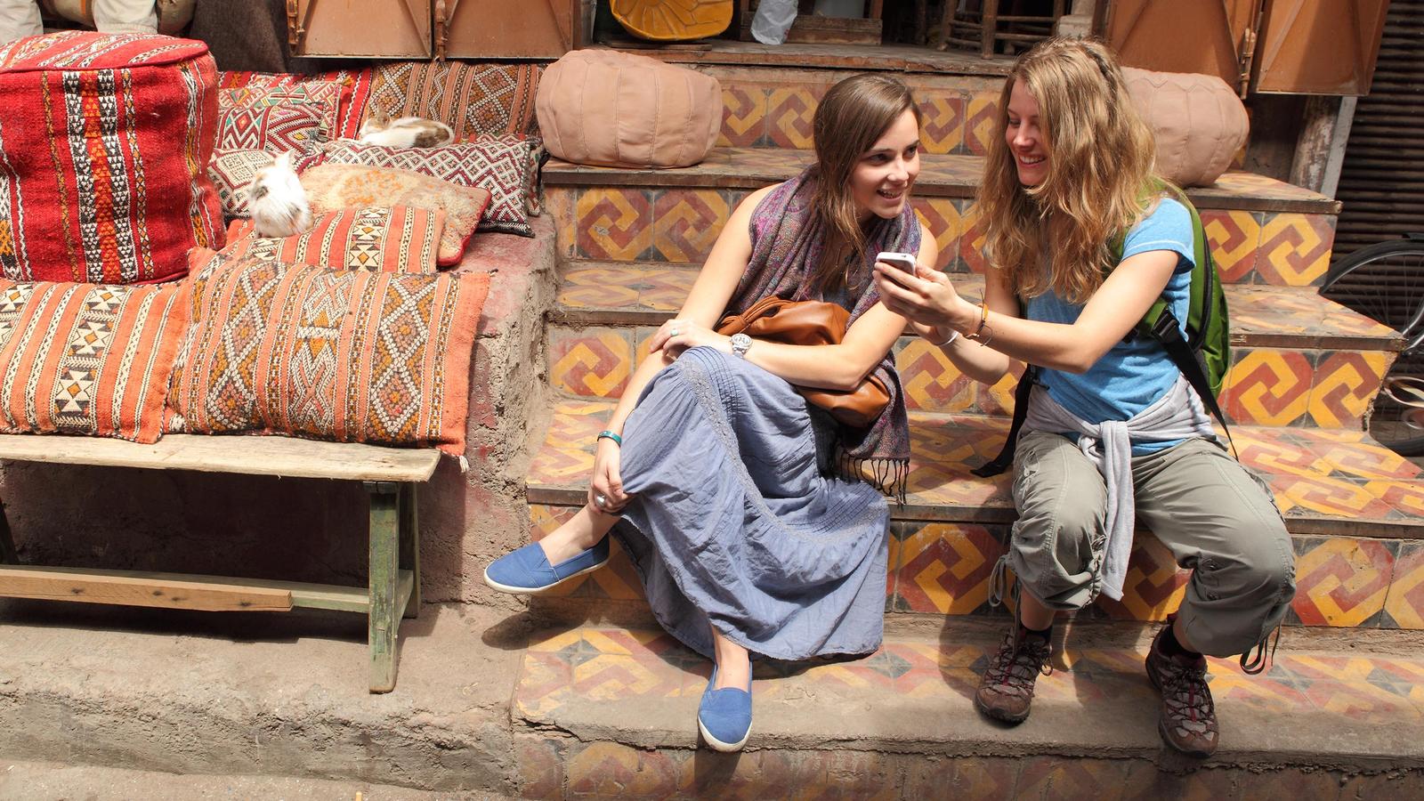 Two girls hanging out in the markets of Marrakech