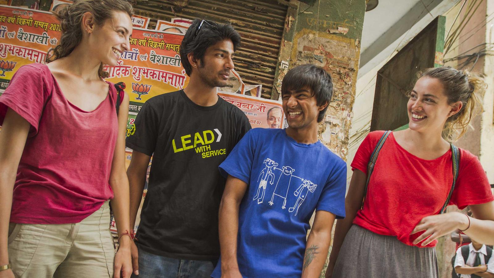 Locals and travellers sharing a laugh.