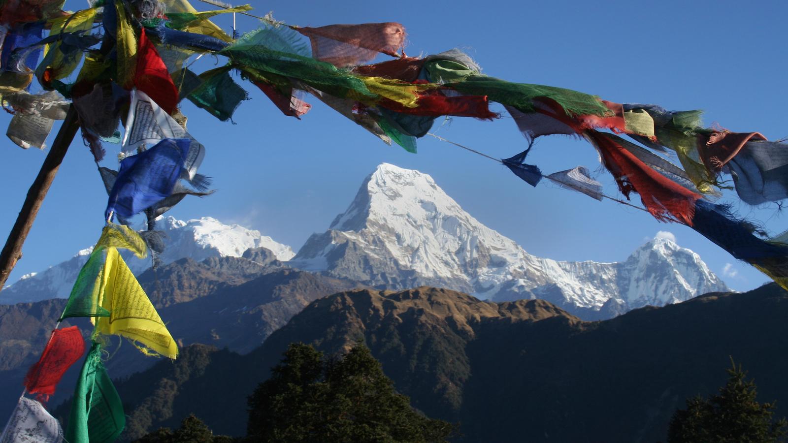 Prayer flags frame Annapurna Mountain