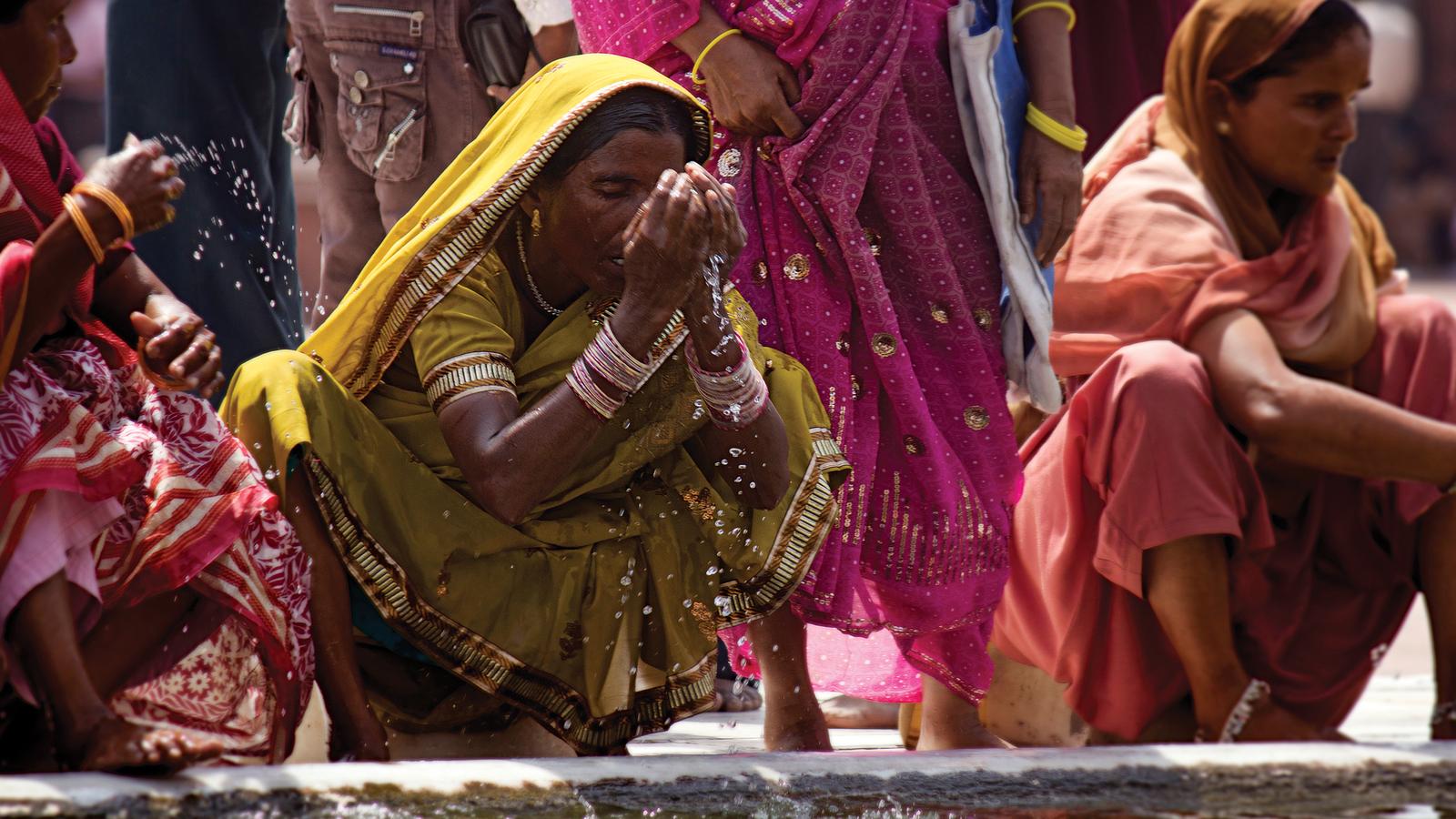 Woman bathing in the Ganges River