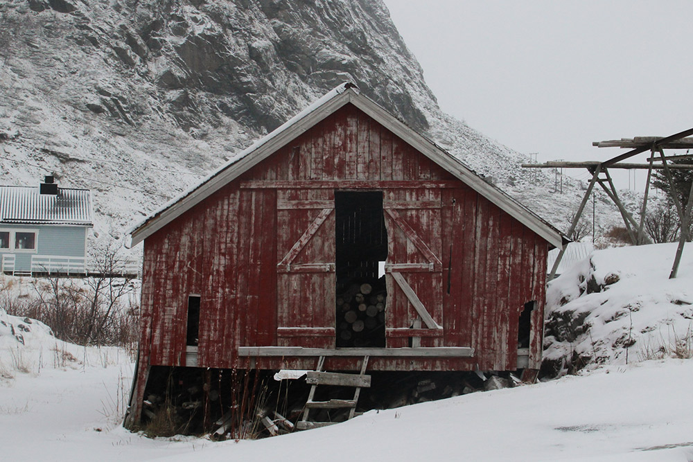 Things that jog my memory: stacks of firewood keeping dry in Lofoten woodsheds.