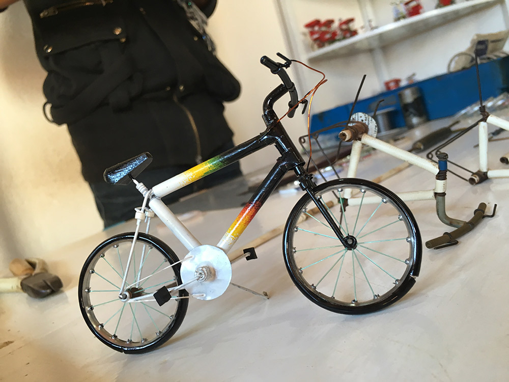 These tiny model bicycles are fashioned from recycled materials.