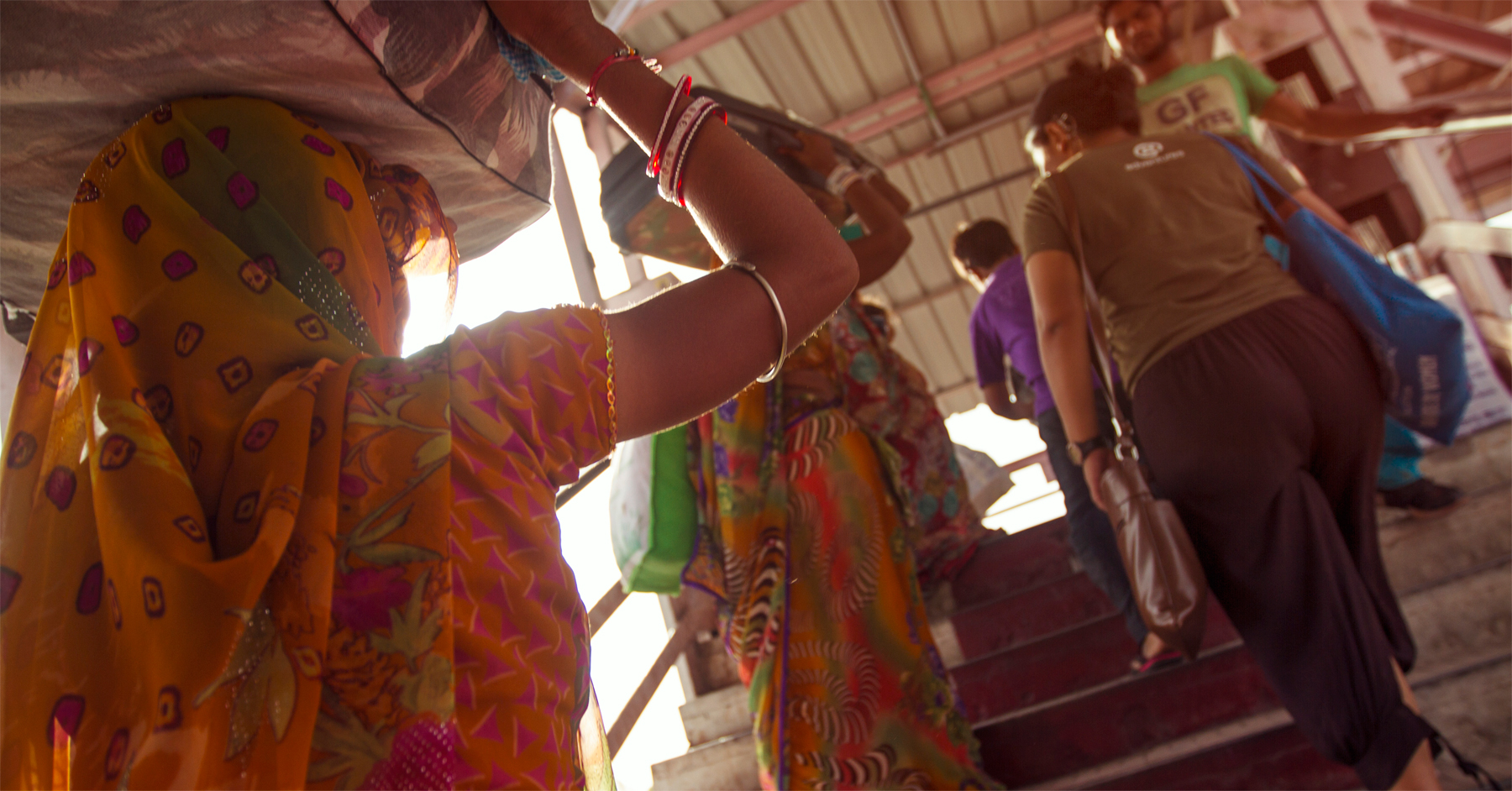 Life goes on at the train station in Delhi.