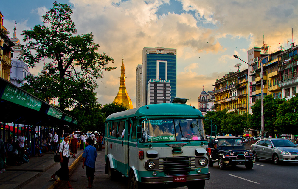 Burma's buses are cheap and convenient — just don't ask if they're running on time. Photo courtesy of Onny C.