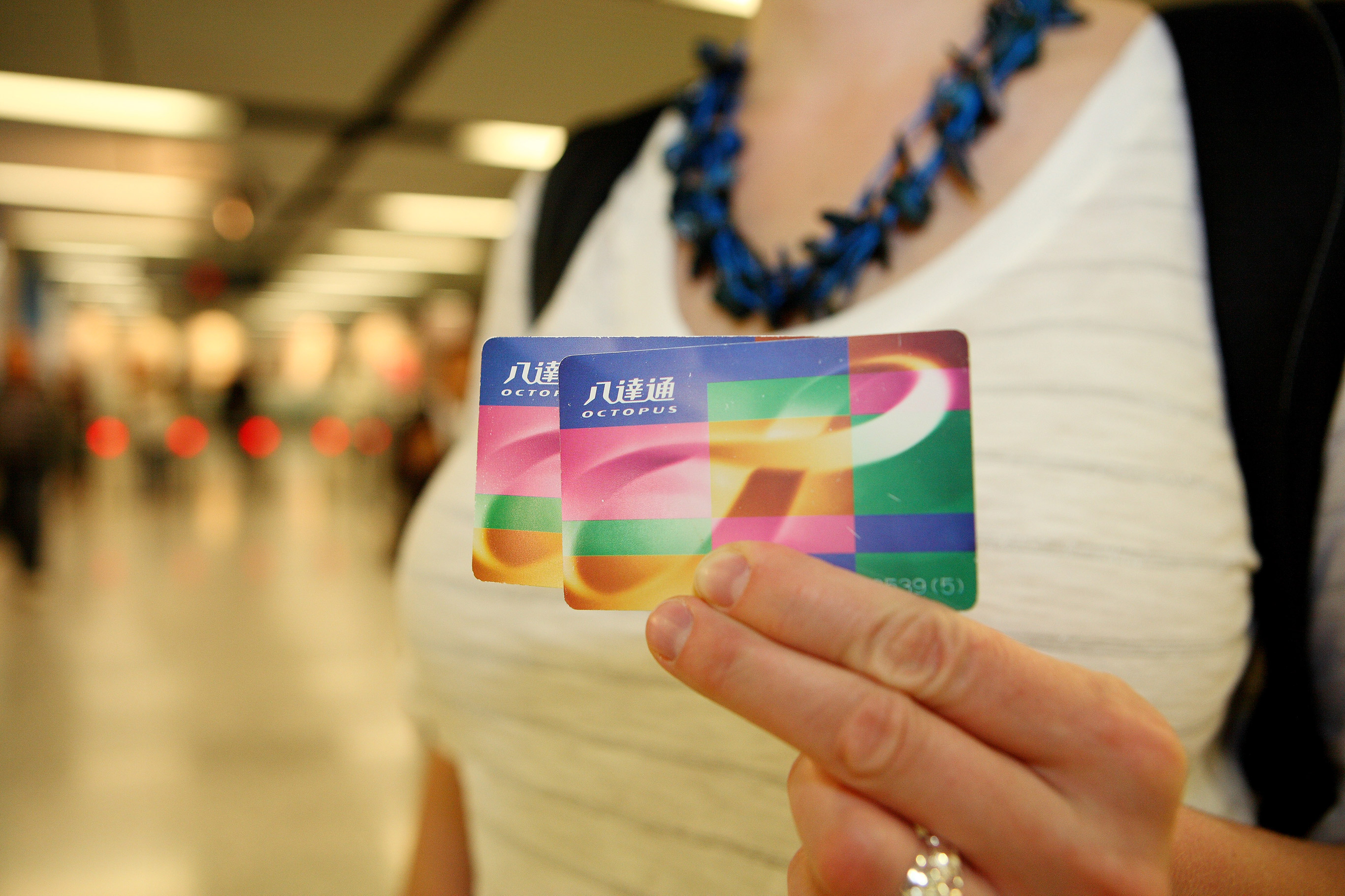 Get your hands on an Octopus card. Photo courtesy Pawel L.