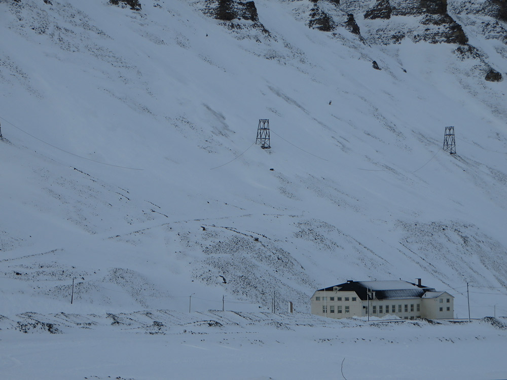 Nestled into the side of a snowy hill is one of the largest wine cellars in all of Europe. Photo courtesy Bernt R.