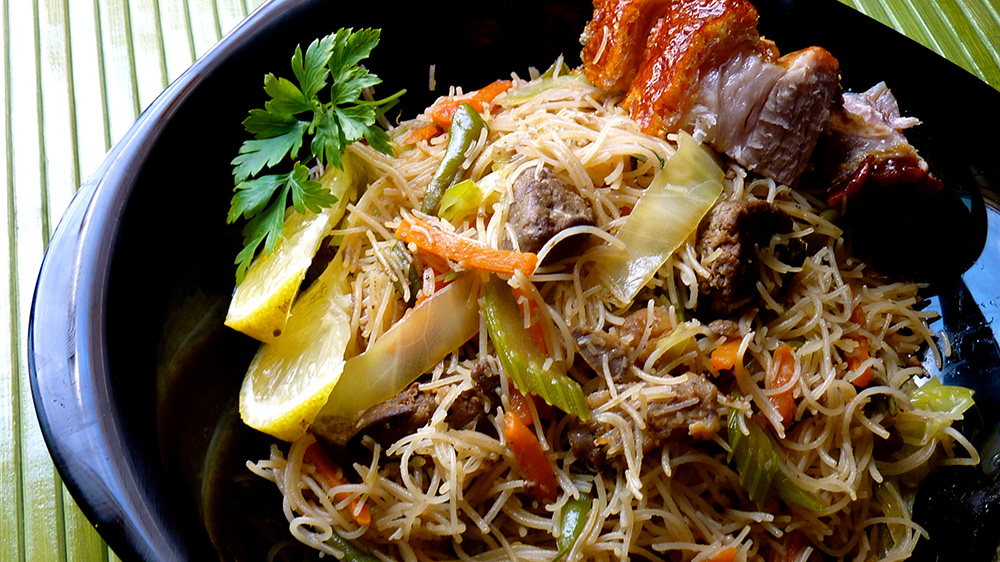 A variety of pancit, a Filipino noodle dish. Photo courtesy of Allan Reyes.