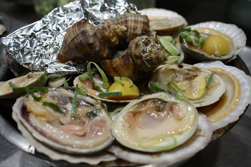 Raw shell fish.