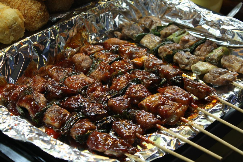 Korean barbecue often involves lots of meat skewers.