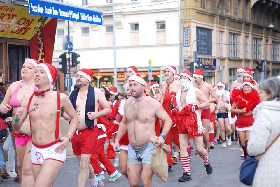 These naked Santas need to keep moving or they'll freeze! Photo courtesy Mikulás Kocogás.