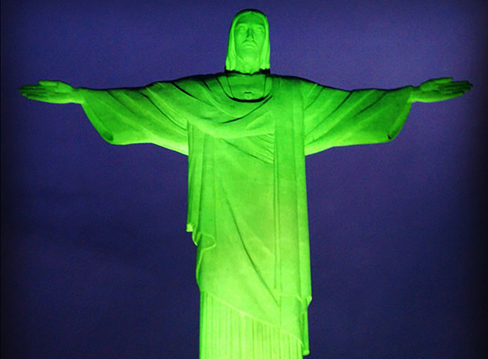 Rio's famous Christ the Redeemer statue, seen here lit green for the U.N. Summit in 2010, is also lit green on St. Patrick's Day. Photo courtesy of Art Jonak.