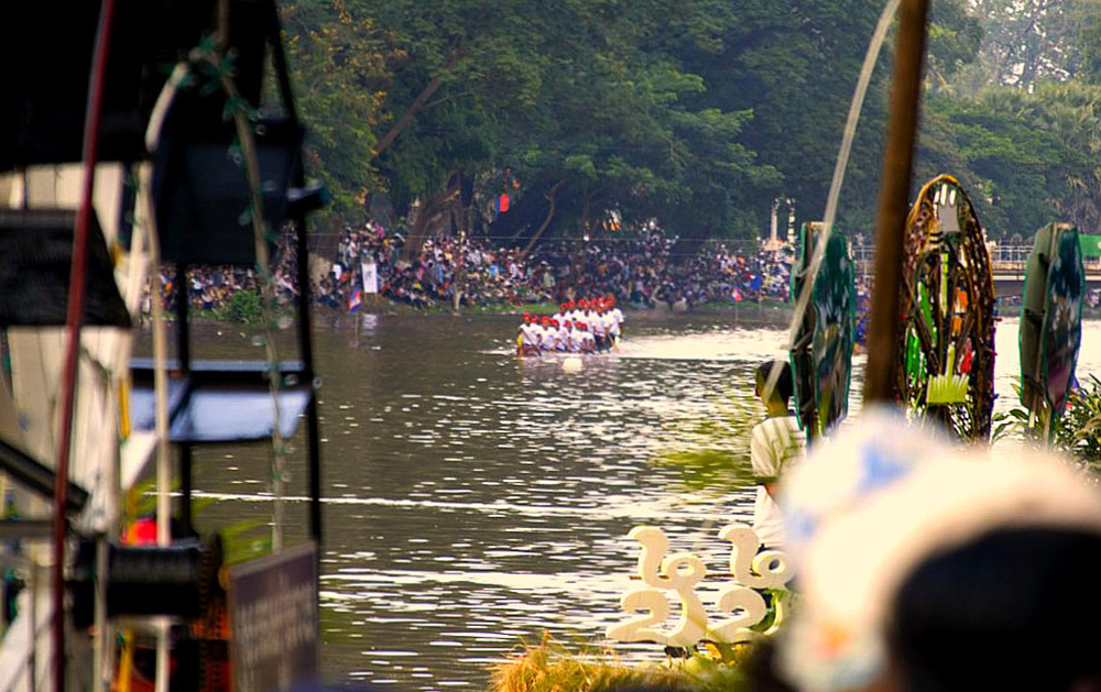 Boats racing during the Cambodian Water Festival. Photo courtesy of Jim Davidson.