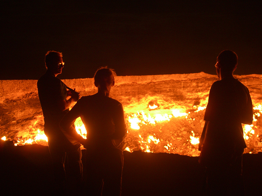 Feeling the heat from the never-ending flames of the Darvaza gas crater.