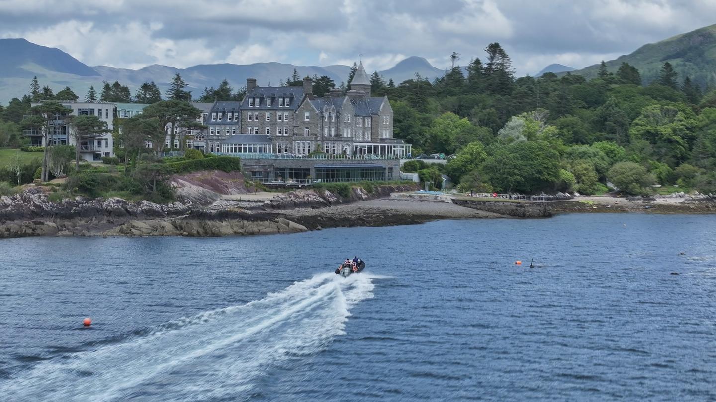 Image of the property from the water on a clear blue day